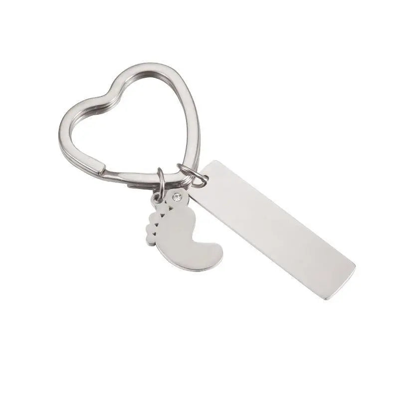 Schlüsselanhänger Babyfuss - Silber